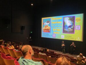 People sit in a theater preparing to watch The Lorax at SIFF cinema as part of the ParkPunks Family Friendly Film Series, 2025